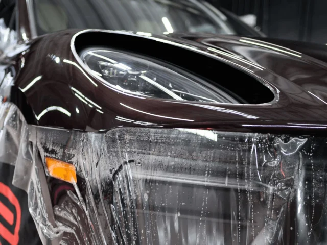 Porsche really said: “make the hood one piece and put the headlights inside it.” So yeah. PPF day.#paintprotectionfilm #ppf #ceramiccoating #paintcorrection #macan